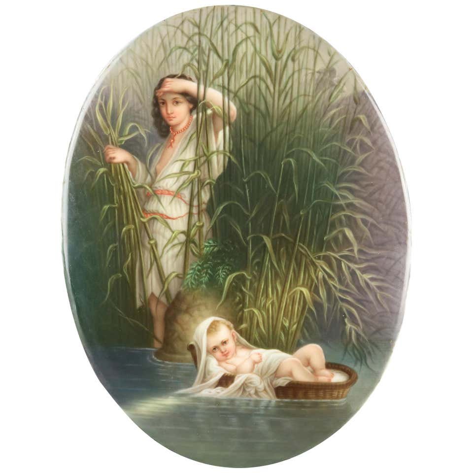 Antique KPM School Painting on Porcelain of Baby Moses: An antique painting on porcelain in the manner of KPM depicts the Biblical story of Pharaoh's daughter finding baby Moses in a basket on the river, circa 1890. Measures: 7.5" H x 5.75" W x .25" D. ***
