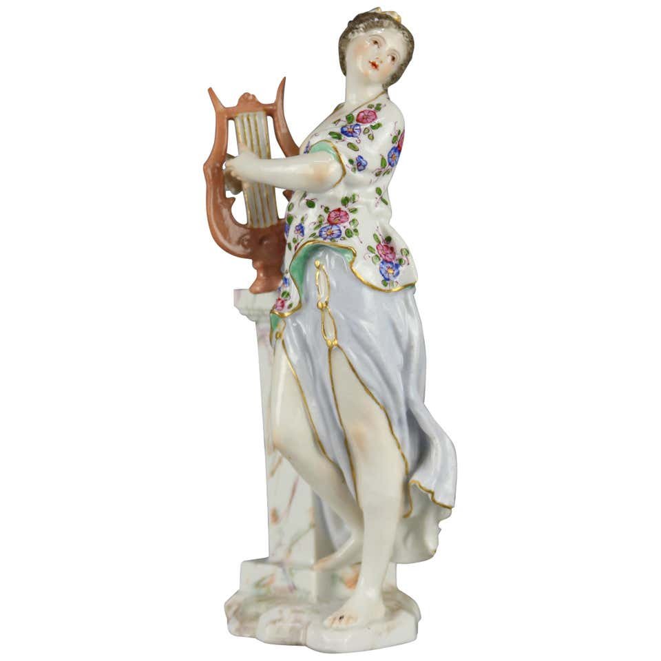 German Meissen Porcelain Figure Classical Woman & Harp: An antique German Meissen porcelain figure offers hand painted and gilt classical woman playing harp in countryside setting, marked on base as photographed, 19th century. Measures: 8.25" H x 3.75" W x