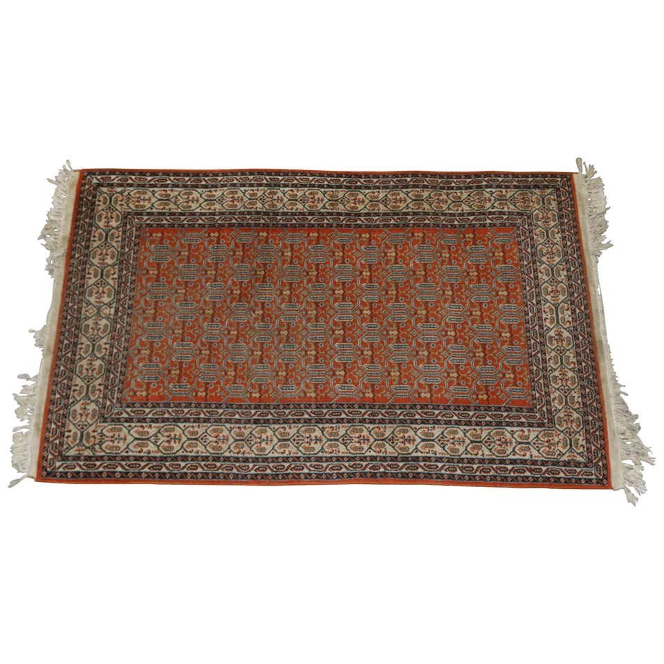 Antique Persian Serebend Oriental Wool Rug, circa 1920: An antique Persian Serebend oriental rug offers wool on cotton construction with repeating stylized foliate pattern on brick ground with complimenting border having stylized foliate and floral pattern
