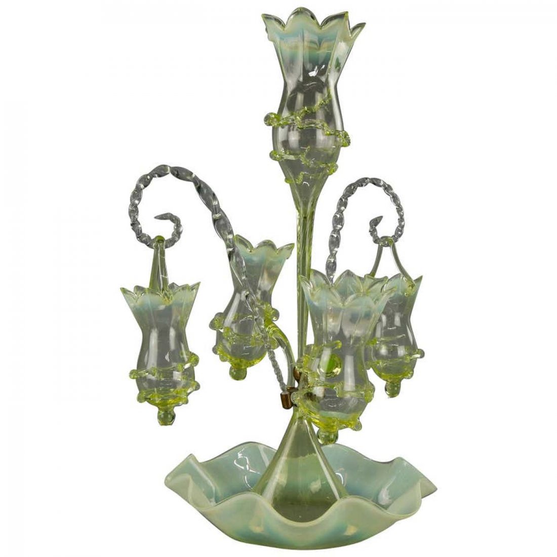 Victorian Art Glass Vaseline Epergne Centerpiece, c1890: An antique Victorian epergne centerpiece offers vaseline glass construction with floral form hanging and fixed vases (vessels) with applied string decoration on conical base with ruffled rim, c1890. M