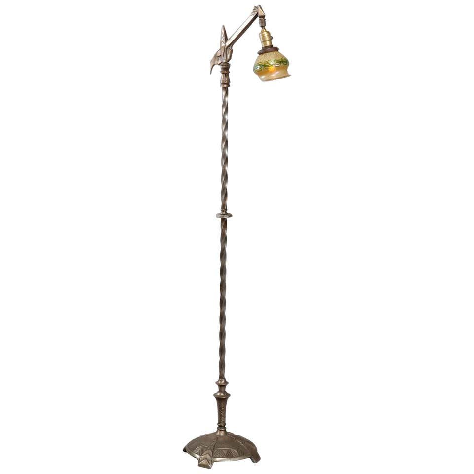 Arts & Crafts Rembrandt School Goose Neck Floor Lamp: An antique Arts & Crafts goose neck floor lamp in the manner of Rembrandt offers twisted column on footed base and with art glass shade in the manner of Steuben, circa 1910. Measures: 58.5" height x 1