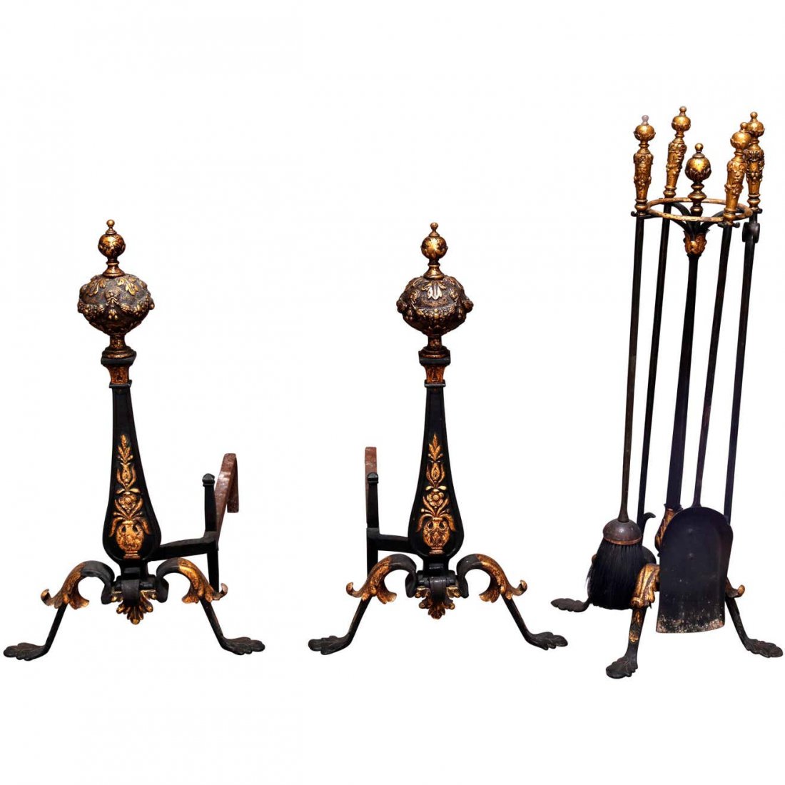 Lg Louis XV Ebonized & Gilt Wrought Iron Fireplace Set: An antique and large French Louis XV fireplace tool set offers ebonized wrought iron andirons having stylized urn form with gilt panier de fleurs surmounted by high relief foliate ball finial and rais