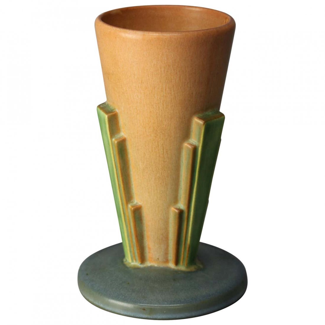 Vintage Roseville Futura Art Pottery Buttress Vase: A vintage art pottery vase by Roseville of the Futura line offers stylized southwestern design with flared terracotta glazed vessel having four green buttresses in the manner of stylized dessert folia