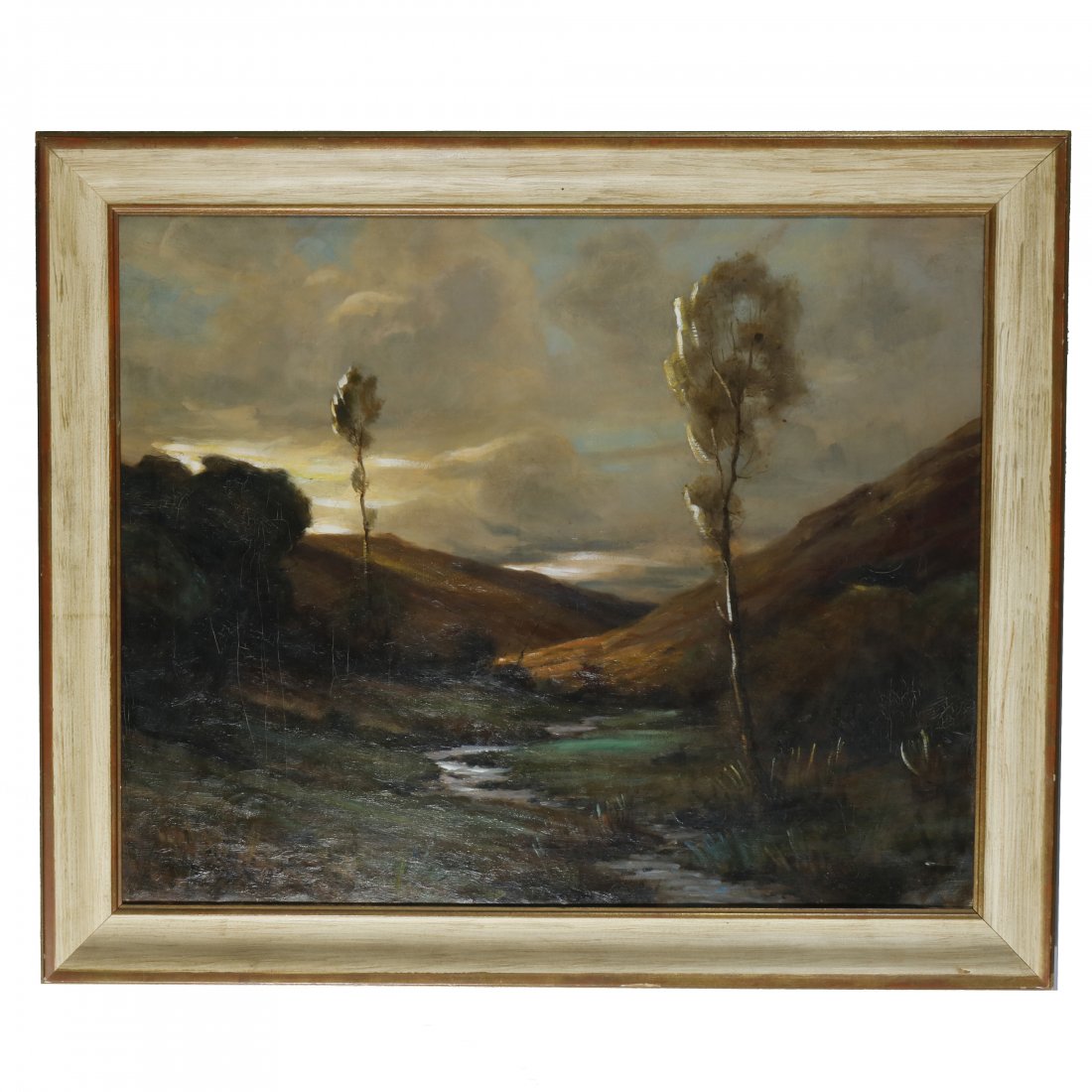 Impressionistic Landscape Painting, Louis Aston Knight: An antique English Impressionistic landscape oil on canvas painting by Louis Aston Knight offers mountainous stream scene with trees and troubled skies, en verso identifying label as photographed, sea