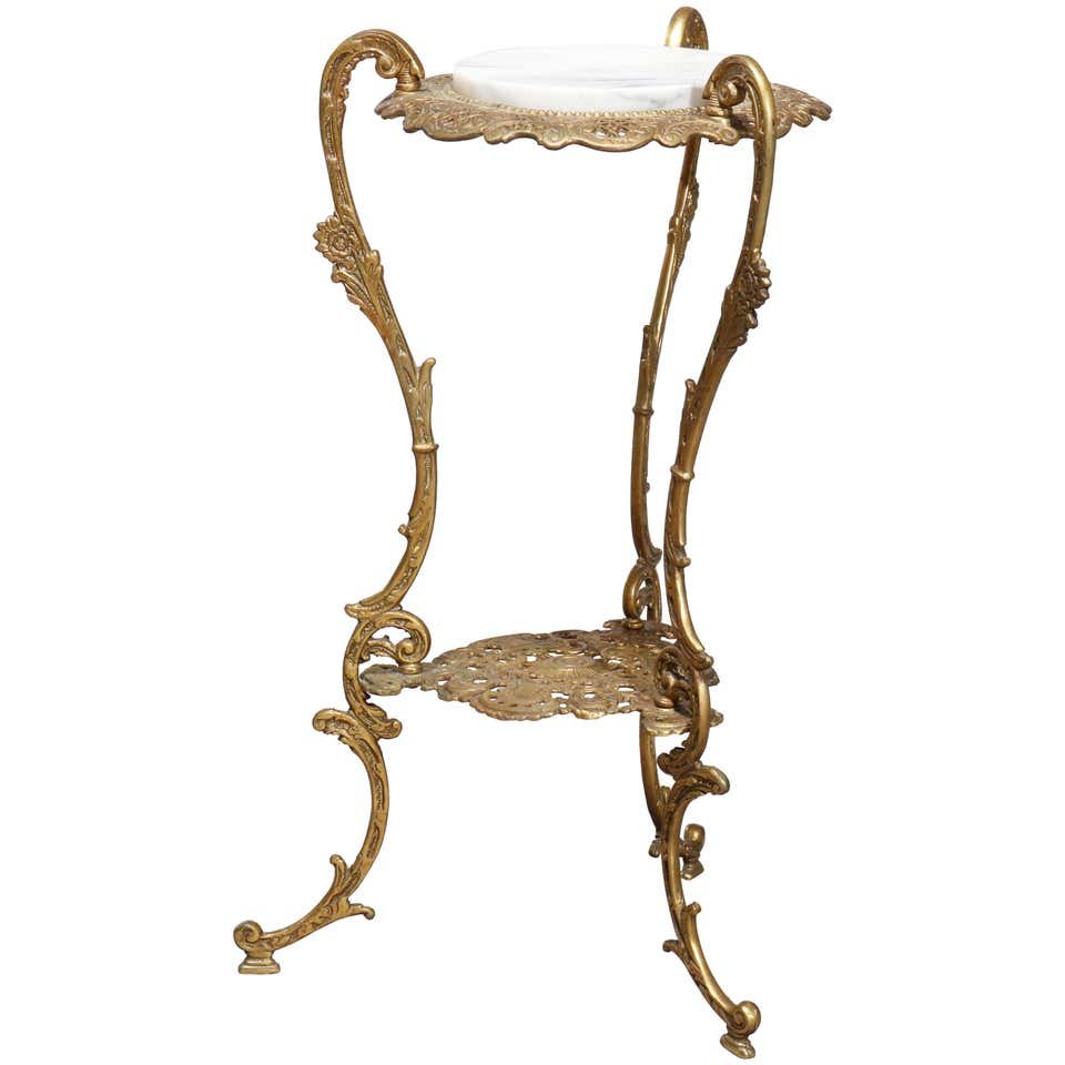 Louis XIV Gilt Bronze & Marble Foliate Fern Stand,c1900: An antique French Louis XIV fern stand offers marble top surmounting gilt bronze base having pierced foliate frame raised on three foliate form cabriole legs with lower display, circa 1900. Measures: 