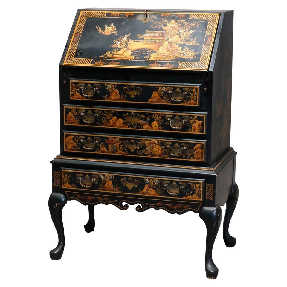 Chinoiserie Chippendale Style Drop Front Secretary: A vintage Chippendale style secretary offers chinoiserie decorated ebonized finish with landscape and garden scenes having pagodas and birds including herons, slant front drops down to reveal desk wit