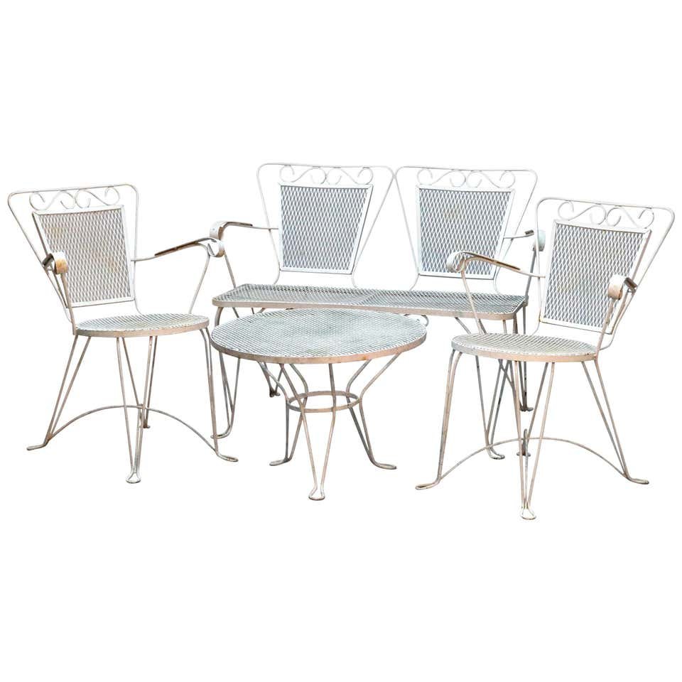 Mid-Century Modern 4-Piece Metal Mesh Garden Patio Set: A Mid-Century Modern 4-piece garden patio set offers white painted metal construction having scroll arms, ice cream parlor wire legs with mesh seats and backs, includes a double bench (settee), two ar