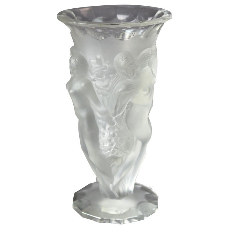 French Lalique School Figural Nude Frosted Art Glass Vase, circa 1920: A French art glass vase in the manner of Lalique offers flared form with nudes (women) in relief, circa 1920. Measures - 8.5" height x 4.75" diameter. *** OPTIONAL SHIPPING & DELIVERY - While onsite r