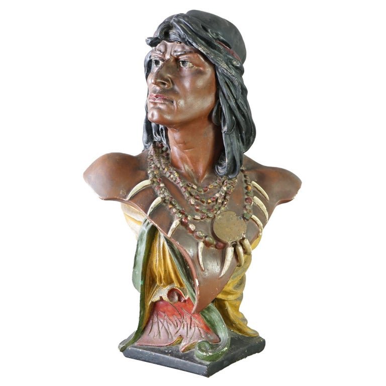 Antique Hiawatha Cigar Store Polychrome Plaster Bust of Indian Warrior c1900: An antique Hiawatha cigar store portrait bust offers polychrome chalkware construction in the form of an American Indian warrior, c1900. Measures - 28.5"h x 17.5"w x 10"d. *** OPTIONAL SHIPPING & DELI