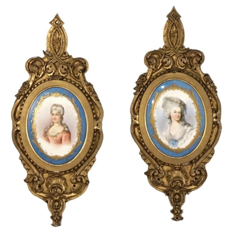 Antique Pair French Sevres Porcelain Portrait Plaques, Marie Antoinette, 19thC: An antique pair of Sevres porcelain portrait plaques featuring Marie Antoinette seated in carved giltwood frames, 19thC. Measures- 17.5''H x 7.5''W x 1''D. *** OPTIONAL SHIPPING & DELIVERY - While ons