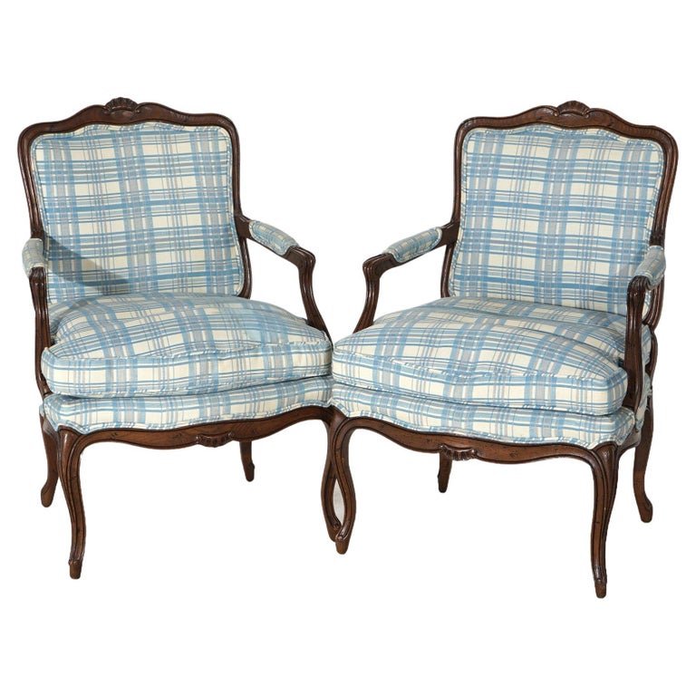Antique Pair Henredon French Louis XV Style Upholstered Mahogany Armchairs C1940: A pair of arm chairs by Henredon offer mahogany frames with shaped rail having central carved gadroon element over upholstered back and seat, raised on cabriole legs, maker label as photographed, c194