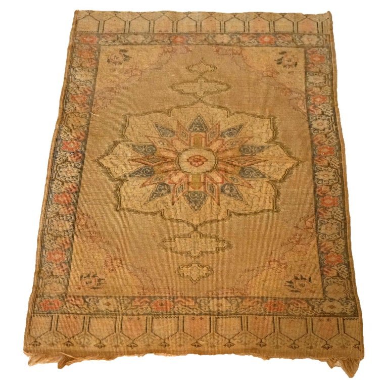 Antique Turkish Wool Throw Rug C1920, 35" x 23": An antique Turkish throw rug offers wool construction with central medallion having stylize floral design, c1920. Measures - 35" x 23". *** OPTIONAL SHIPPING & DELIVERY - While onsite retrieval is alw