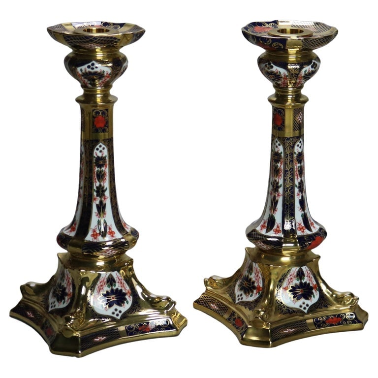 Pr English Royal Crown Derby Old Imari Bone China Gilt Candlesticks with Seal: Pair of English Royal Crown Derby Old Imari Bone China Gilt Candle Sticks with Seal 20thC. Measures - 10 3/4" x 5 1/4" x 5 1/4". *** OPTIONAL SHIPPING & DELIVERY - While onsite retrieval is always wel