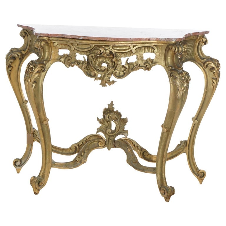 French Rococo Style Giltwood & Marble Top Console Table C1890: Antique French Rococo Style Giltwood & Marble Top Console Table with Shaped Top, Foliate & Floral Elements, Raised on Cabriole Legs with Asymmetric Foliate Form Finial, C1890. Measure - 41"h x 56"w x