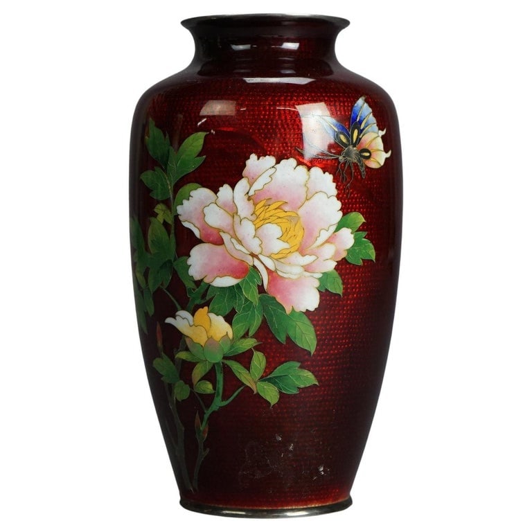 Antique Japanese Meiji Cloisonne Enameled Vase with Floral Design C1920: Antique Japanese Meiji Cloisonne Enameled Vase with Garden Flower & Butterfly Design C1920. Measures - 7.25"H x 3.75"W x 3.75"D. *** OPTIONAL SHIPPING & DELIVERY - While onsite retrieval is always wel