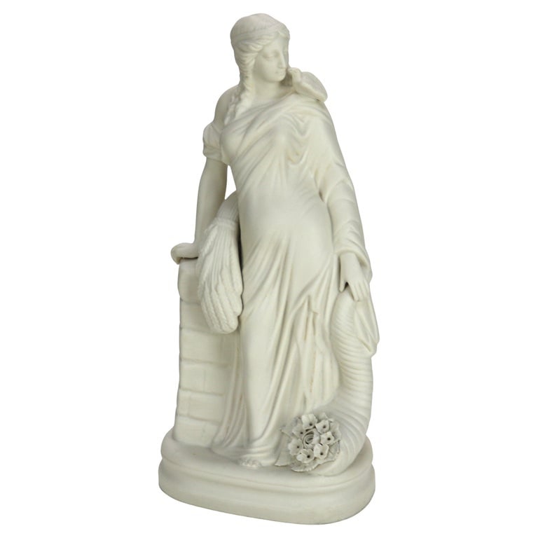 13" Parian Ware Bisque Porcelain Figure of a Classical Woman with Cornucopia: Antique Parian Ware Bisque Porcelain Figure of a Classical Woman with Cornucopia & Wheat C1880. Measures- 13"H x 5.75"W x 4"D. ** OPTIONAL SHIPPING & DELIVERY - While onsite retrieval is always welcom