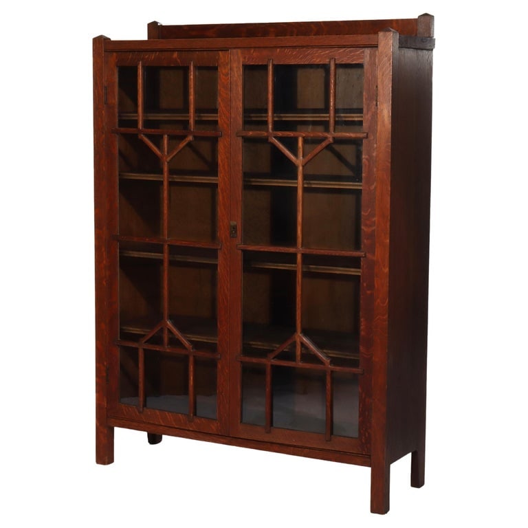Antique Arts & Crafts Oak Double Door Bookcase C1920: Antique Arts & Crafts Oak Double Door Bookcase Unsigned C1920. Measures - 58 3/8" x 41 1/2" x 13". A finely crafted antique bookcase from the Arts & Crafts movement, dating to circa 1920. This piece f