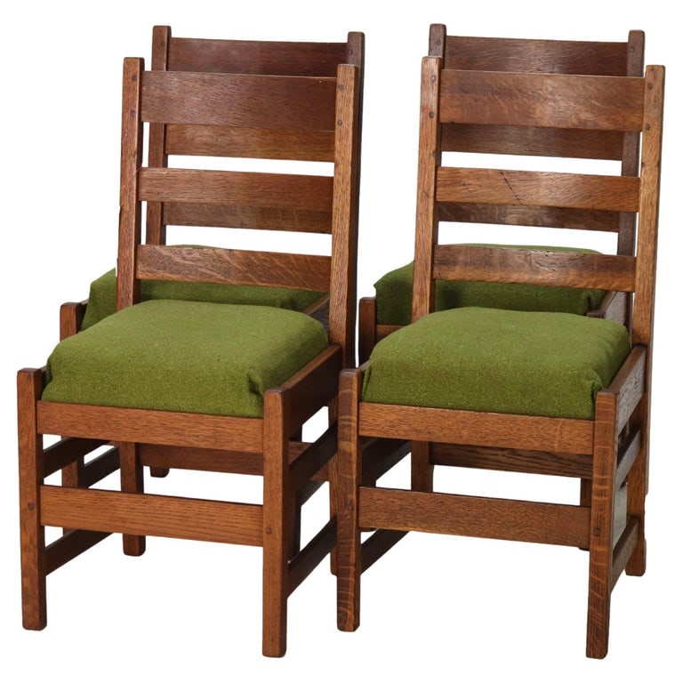 Four Antique L & JG Stickley Oak Dining Chairs C1910: Four Antique L & JG Stickley Oak Dining Chairs Unsigned C1910. Measures- 36"H x 18.25"W x 20"D, sh 19". A set of four antique oak dining chairs attributed to L & JG Stickley, dating from around 1910.