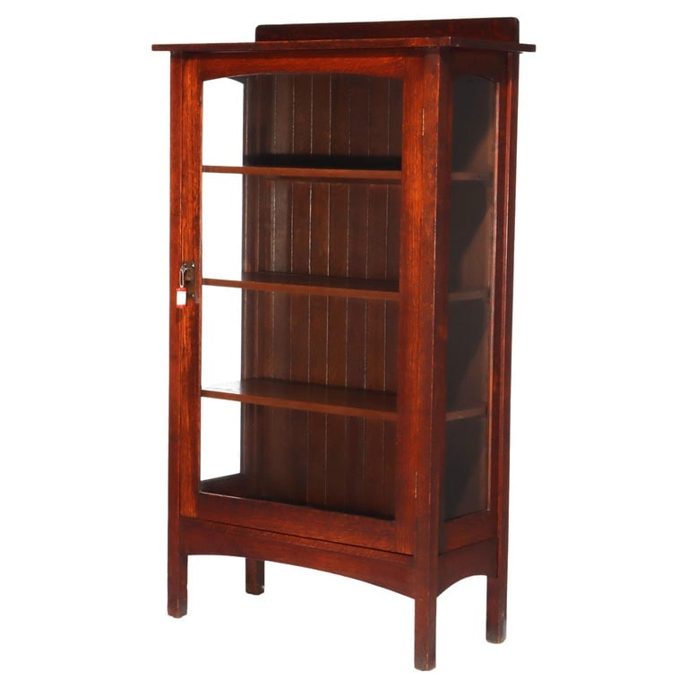 Stickley Onondaga Shops School Arts & Craft Oak Single-Door China Cabinet: Antique Stickley Onondaga Shops School Arts & Craft Oak Single-Door China Cabinet c1910. (63" x 36 1/2" x 15 1/2"). A finely crafted antique oak china cabinet attributed to the Stickley Onondaga Shops