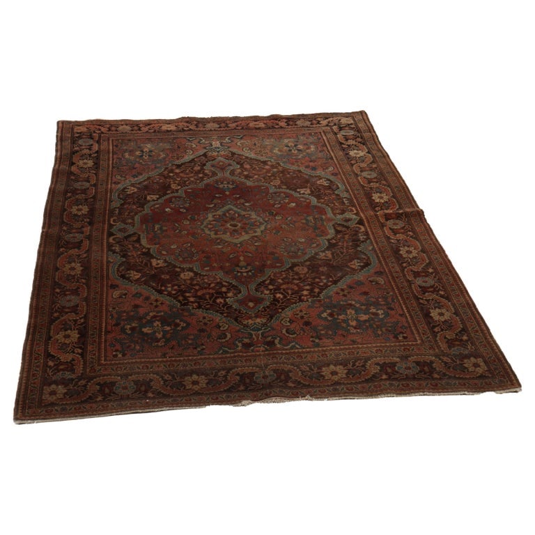 Antique 83" Farahan Sarouk Wool Area Rug C1920: Antique Farahan Sarouk Wool Area Rug C1920. Measures - 83" x 53 1/2" x 1/2". This antique Farahan Sarouk area rug, dating to circa 1920, showcases the intricate craftsmanship typical of Persian rugs f