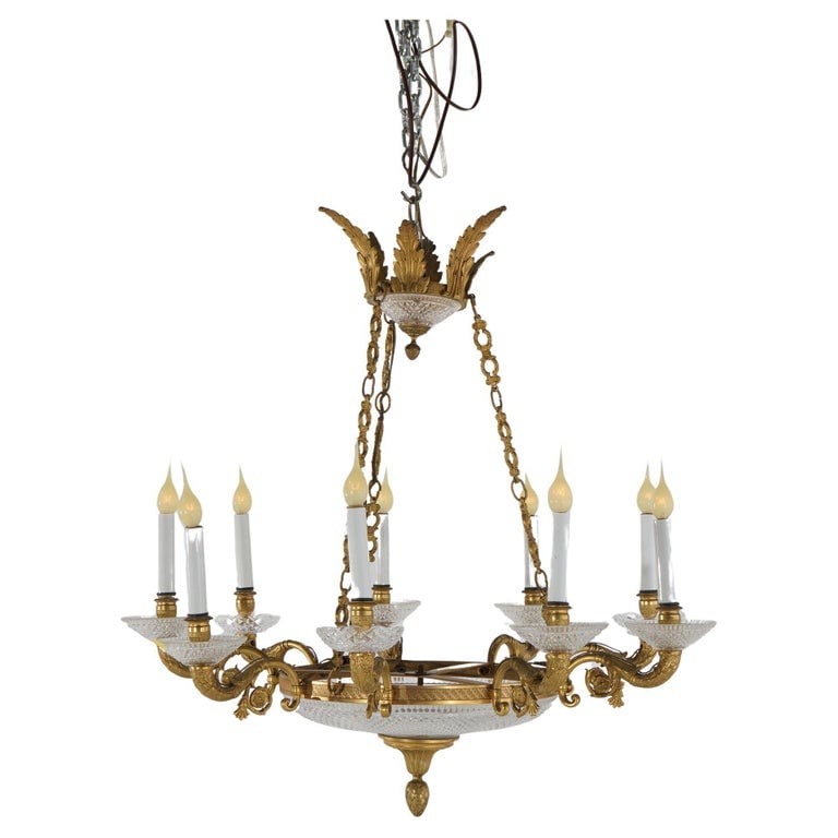 French Louis XIV Style Gilt Bronze & Crystal Nine-Light Chandelier c1910: Antique French Louis XIV Style Gilt Bronze & Crystal Nine-Light Chandelier with Foliate Elements, c1910. Measures - 37"h x 29.5"diam. *** OPTIONAL SHIPPING & DELIVERY - While onsite retrieval is alway