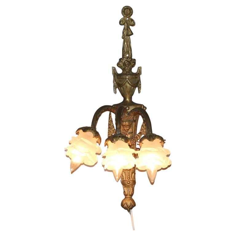 Antique Gilt Bronze Figural Three-Light Wall Sconce with Persian Mask C1920: Antique Gilt Bronze Figural Three-Light Wall Sconce with Persian Mask C1920. A stunning antique gilt bronze wall sconce from circa 1920, featuring a figural design with a Persian mask motif. This thre