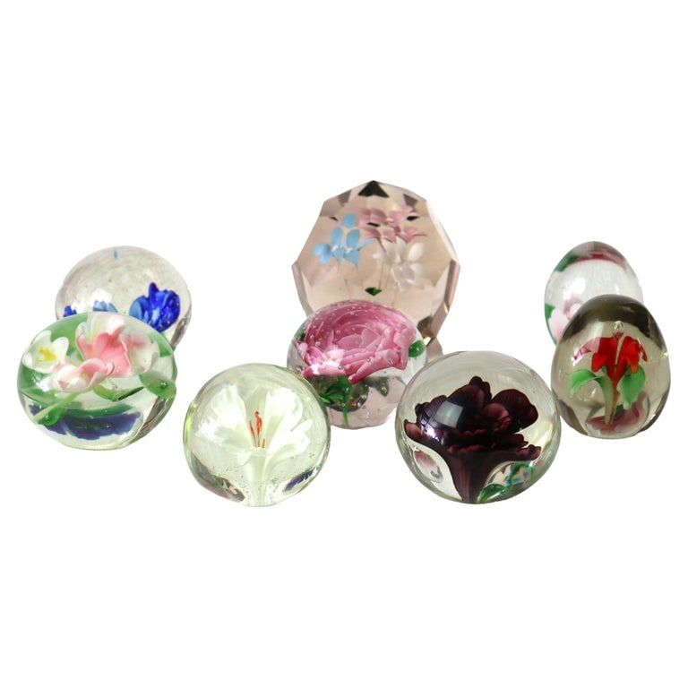 Eight Antique Baccarat School Floral Glass Paperweights c1920: Eight Antique Baccarat School Floral Glass Paperweights Unsigned C1920. (sizes from 2 1/2" x 2 1/2" x 2 1/8" to 3 3/4" x 3 5/8" x 3 5/8"). A collection of 8 exquisite antique glass paperweights in the