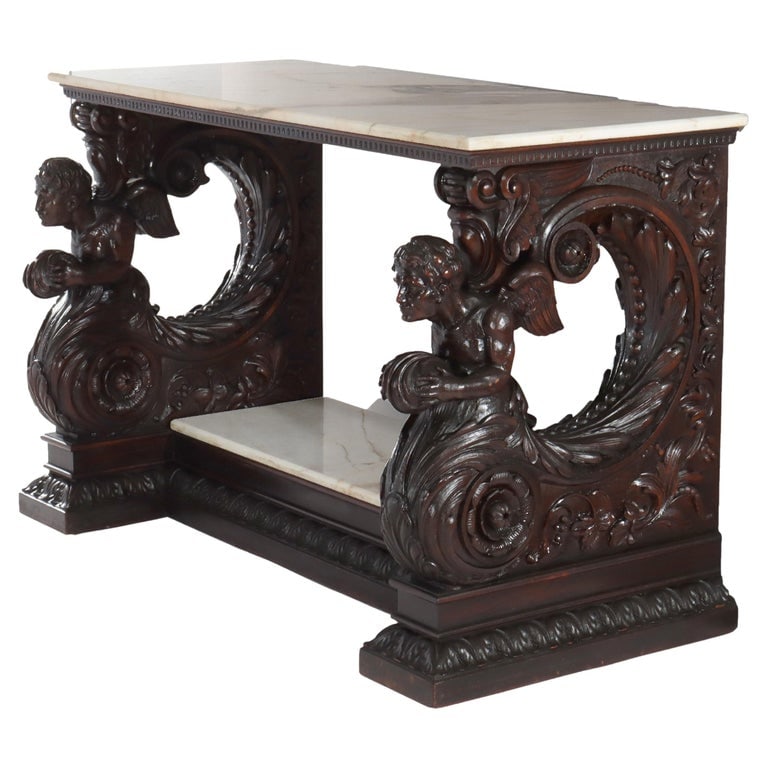 Italian Baroque Figural Carved Walnut & Marble Top Console Table 18thC: Antique Italian Baroque Figural Carved Walnut & Marble Top Console Table 18thC. Measures - 32"H x 51"W x 23.5"D. An exquisite 18th-century Italian Baroque console table, crafted from richly carved wal