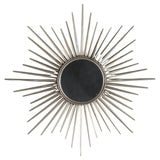 Vintage MCM Silver Gilt Metal Sunburst Mirror Unsigned C1970: A vintage Mid-Century Modern (MCM) sunburst mirror, crafted circa 1970. This piece features a silver gilt metal frame with spikes that create a sunburst effect. Measures - 39.5"H x 39.5"W x .75"D. ***
