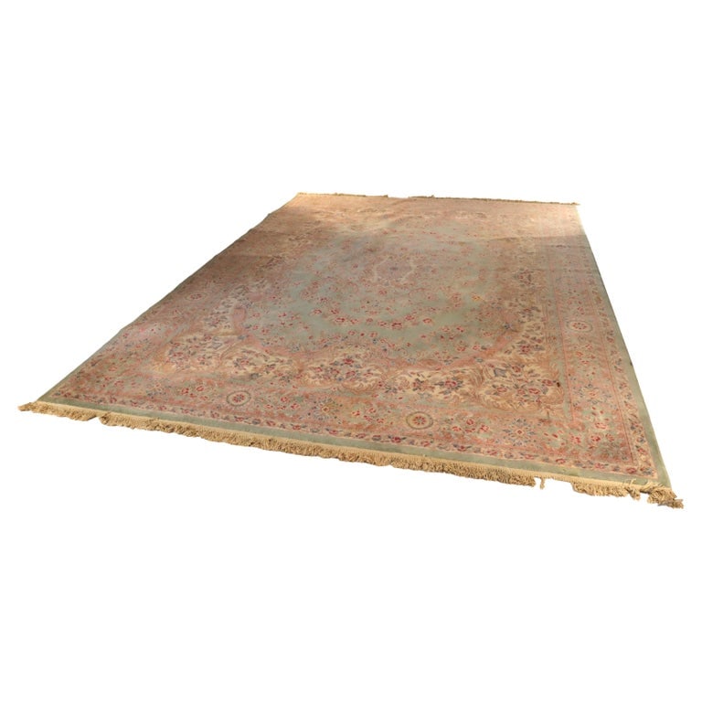 Vintage Karastan Kirman Persian Mint Green Carpet Unsigned C1950: A vintage Karastan Kirman Persian carpet from around 1950, featuring a mint green field with intricate floral and medallion patterns typical of Kirman designs. The carpet is unsigned. Measures - 172"L