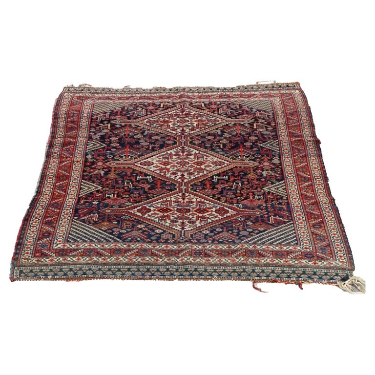 Antique 4.5'x7.5' Shiraz Persian Wool Area Rug With Figural Animal Pattern c1920: This antique Shiraz Persian wool area rug, dating back to circa 1920, features a figural animal pattern. The rug showcases intricate geometric and animal motifs. The craftsmanship reflects the cultura