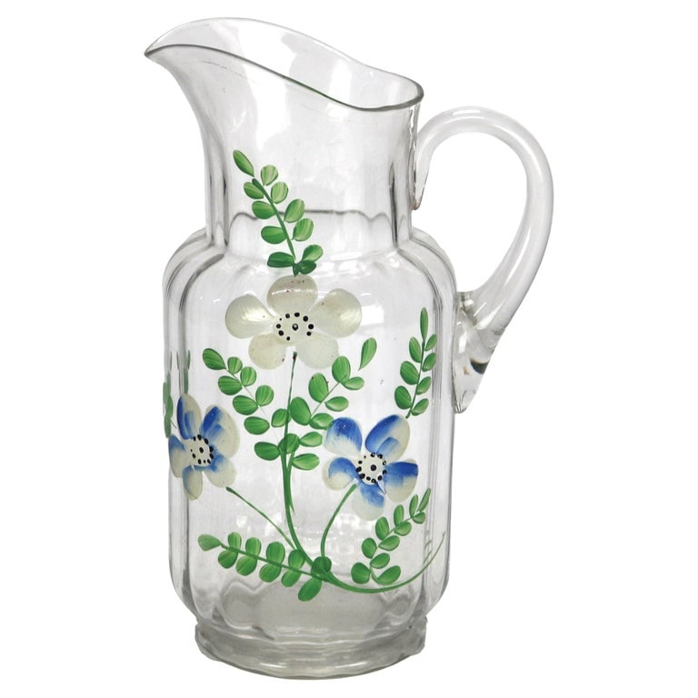 Vintage Floral Hand Painted Glass Water Pitcher C1950: Vintage Floral Hand Painted Glass Water Pitcher C1950. Measures - 11.25"H x 6.75"W x 4.75"D. *** OPTIONAL IN-HOUSE SHIPPING & DELIVERY - While onsite retrieval is always welcome at no charge, IN-HOUSE