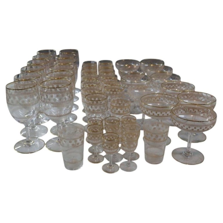 49 Piece Gold Gilt Trimmed Crystal Stemware Set: 49 Pieces Gold Gilt Trimmed Crystal Stemware Set. Measures - 6.25"H x 3"W x 3"D. *** OPTIONAL IN-HOUSE SHIPPING & DELIVERY - While onsite retrieval is always welcome at no charge, IN-HOUSE SHIPPING & 