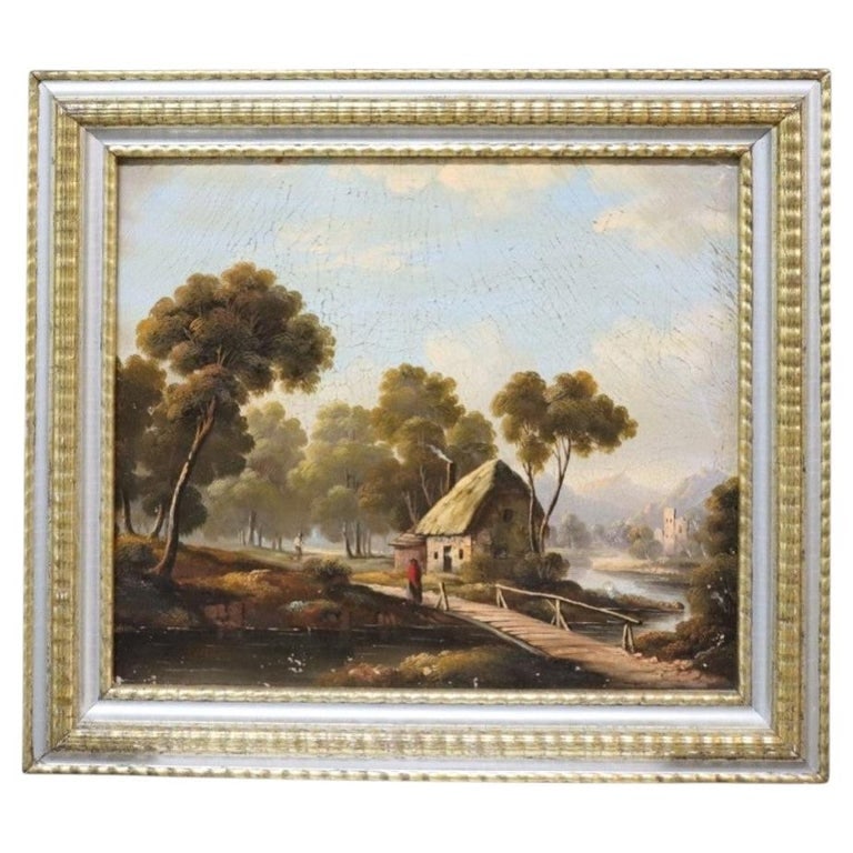 Hudson River School Oil On Canvas Pastoral Landscape Painting 19thC: An antique oil on canvas painting, attributed to the Hudson River School, depicting a serene pastoral landscape. The scene features a rustic thatched-roof cottage beside a tranquil river, with a woode