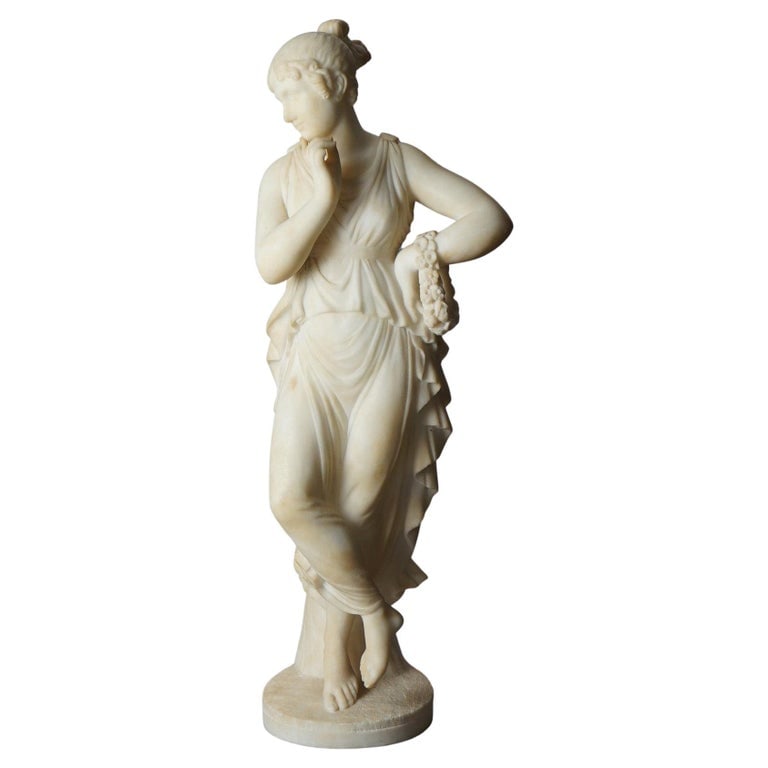 P. Bazzanti 22" Classical Alabaster Sculpture of a Woman, Florence 19thC: This alabaster sculpture by P. Bazzanti depicts a classical woman in a graceful pose. The sculpture showcases fine detailing in the drapery and delicate features, characteristic of Bazzanti's work,