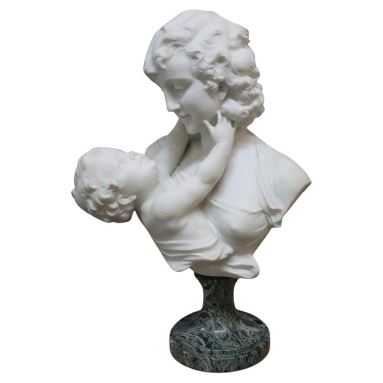 Life Sized 26" Alabaster Mother & Child Cesara, Signed Viviani / Scultore / Pietrasanta: Life Sized Alabaster Mother & Child Bust On Marble Pedestal, Signed "Cesara Viviani / Scultore / Pietrasanta", 19thC. Measures - 26.5"H x 17.75"W x 11.5"D. ** OPTIONAL IN-HOUSE SHIPPING & DELIVERY -