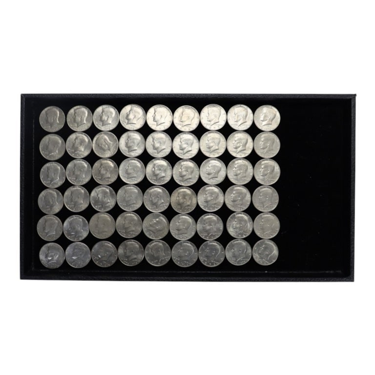 54 Kennedy Half Dollars C1971-1990: 54 Kennedy Half Dollars C1971-1990. Measures - 1.25"W x 1.25"D. *** OPTIONAL IN-HOUSE SHIPPING & DELIVERY - While onsite retrieval is always welcome at no charge, IN-HOUSE SHIPPING & DELIVERY for