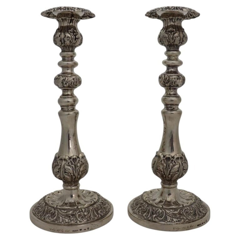 Pair Weighted Sterling Silver Foliate Candlesticks: Pair Weighted Sterling Silver Foliate Candlesticks. Measures - 10.25"H x 4.25"W x 4.25"D. *** OPTIONAL IN-HOUSE SHIPPING & DELIVERY - While onsite retrieval is always welcome at no charge, IN-HOUSE SH
