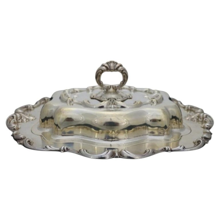 Sterling Silver Dish & Lid 30.6 Troy Ounces: Sterling Silver Entrée Dish & Lid Sterling Mark 30.6Troy Ounces. Measures - 5.25"H x 12"W x 9.5"D. *** OPTIONAL IN-HOUSE SHIPPING & DELIVERY - While onsite retrieval is always welcome at no charge, I
