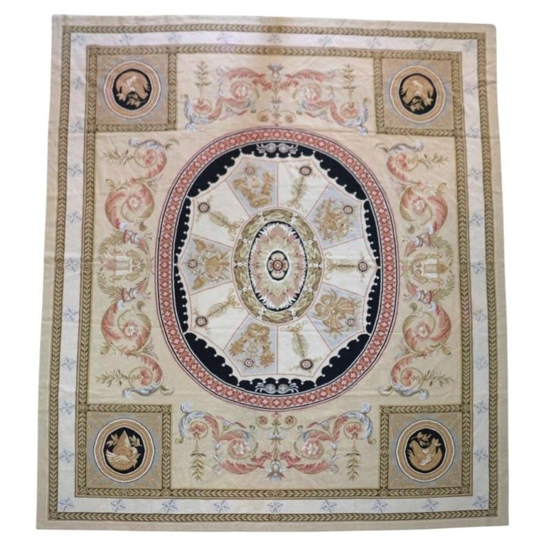 Oversized 141"x104" French Aubusson Floral & Foliate Wool Tapestry c1930: An exquisite oversized antique French Aubusson tapestry, dating from approximately 1930. This textile piece showcases a sophisticated design centered around an elaborate oval medallion, richly adorned