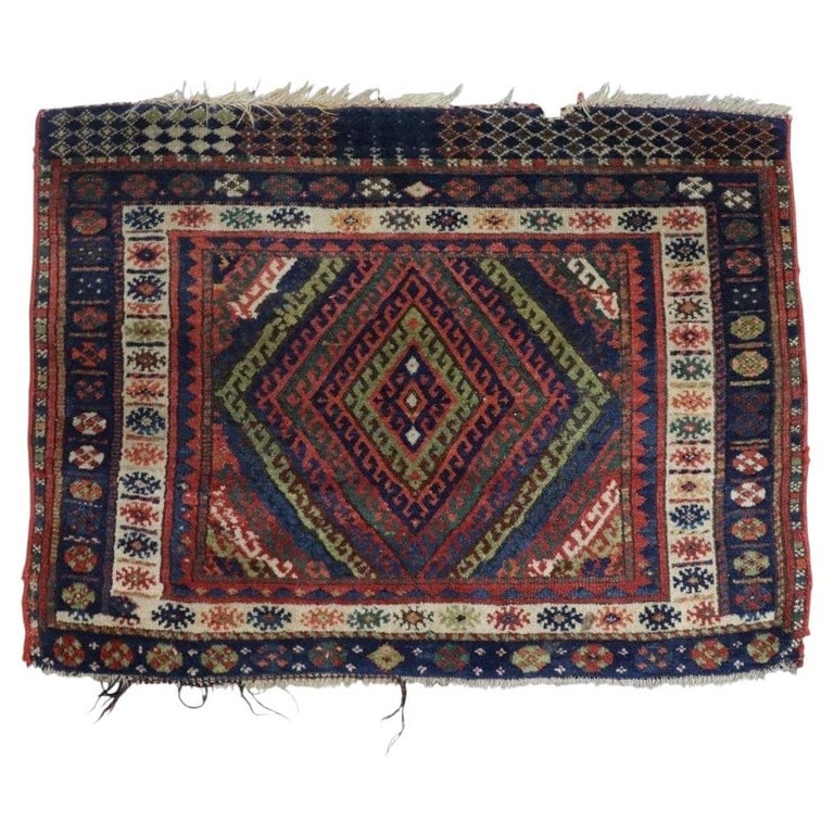 Large Antique Kurdish Oriental 32"x44" Mat With Diamond Medallion c1920: This antique Kurdish Oriental mat, dating to approximately 1920, features a striking diamond medallion pattern at its center. The hand-woven textile showcases a rich palette of traditional colors incl