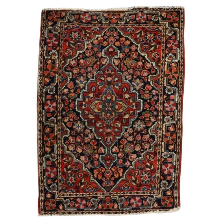 Antique Kashan Persian 34"x23" Wool Mat C1920: This exquisite antique Kashan Persian mat, dating to approximately 1920, exemplifies the revered artistry of traditional Persian rug weaving. Hand-knotted from fine wool, the mat presents a classic ce