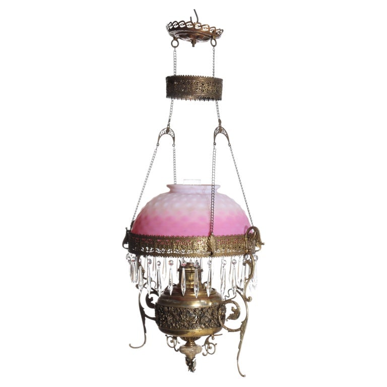 Victorian Brass, Bronze & Crystal Chandelier w/ Peachblow Hobnail Glass Shade C1880: A Victorian hanging chandelier, crafted circa 1880 from a combination of brass and bronze, features a distinctive peachblow hobnail glass shade. The metalwork displays ornate casting with intricate fl