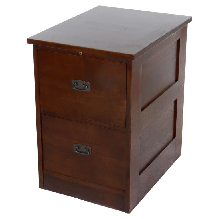 Arts & Crafts Stickley Mission Oak File Cabinet With Hammered Copper Hardware: A Stickley Arts & Crafts Mission oak file cabinet featuring two drawers and hammered copper hardware. This piece is signed and showcases the classic Mission style with its clean lines and sturdy const