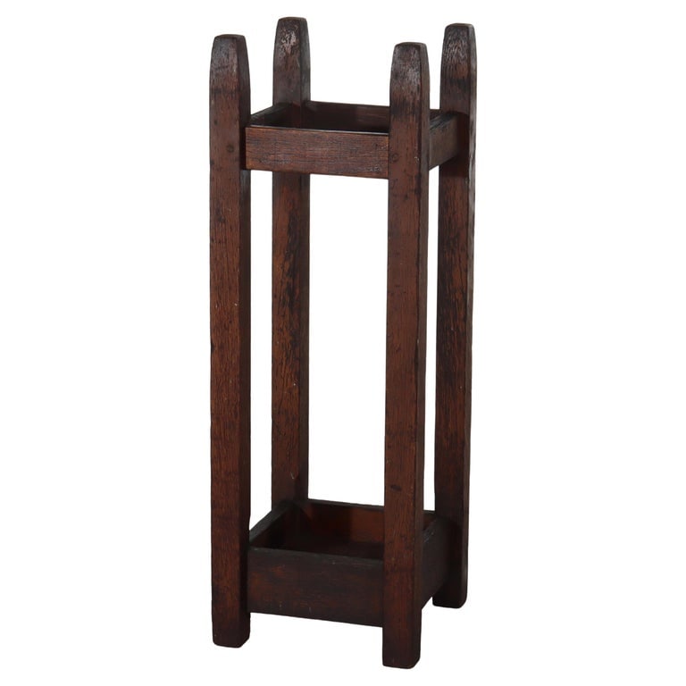 Gustav Stickley Arts & Crafts Mission Oak Umbrella Stand C1910: A fine example of American Arts & Crafts design, this Mission Oak umbrella stand is attributed to the renowned workshops of Gustave Stickley, circa 1910. Crafted from solid oak, the stand features a r
