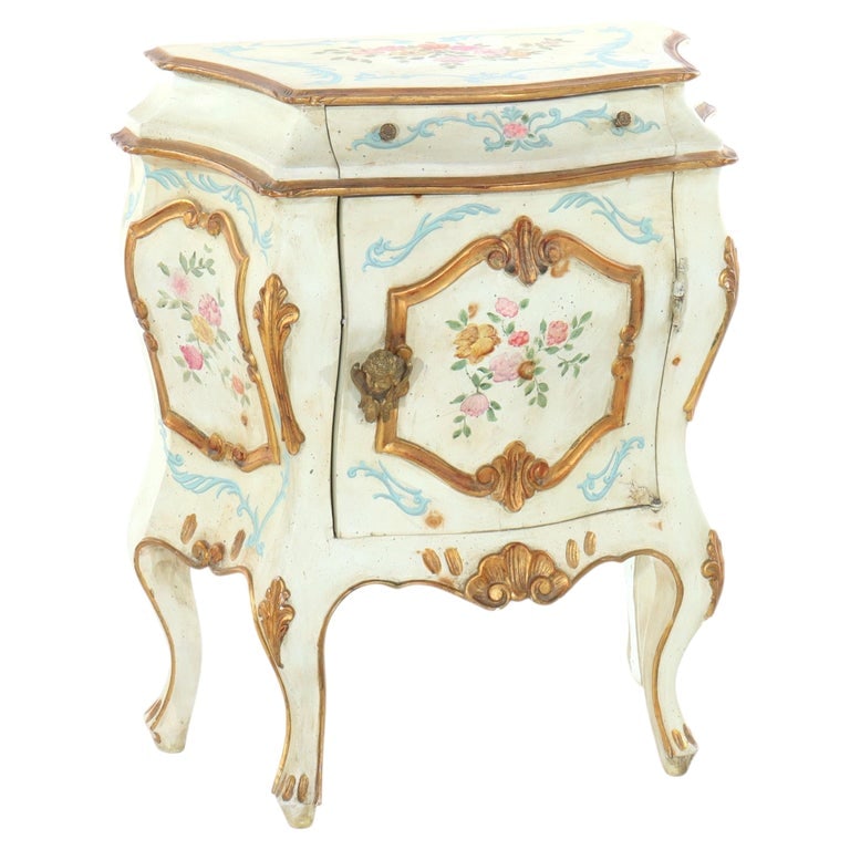 French Rococo Style Louis XIV Hand Painted Bombay Side Stand With Cherubs 20thC: A French Rococo Style Bombay side stand, dating to the 20th Century. The piece features a hand-painted wood construction with gilded accents, embodying the ornate aesthetic of the Louis XIV period. It