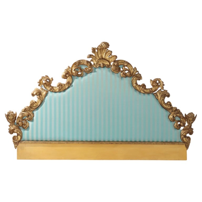 Ditta Pieri & Son Italian Louis XIV Style Figural Carved Giltwood Headboard C1920: This exquisite King Size headboard, meticulously crafted by Ditta Pieri & Son in Firenze, Italy, circa 1920, embodies the opulent grandeur of the Louis XIV style, displaying characteristics also found