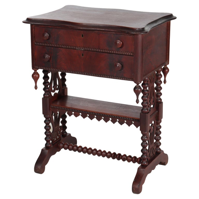 Renaissance Revival Mahogany Work Stand With Lyre Form Trestle Base C1890: Measures - 29 1/4" x 22 7/8" x 17 1/4". A finely crafted Renaissance Revival mahogany work stand dating to circa 1890. This piece features a lyre form trestle base, showcasing intricate craftsmanship 