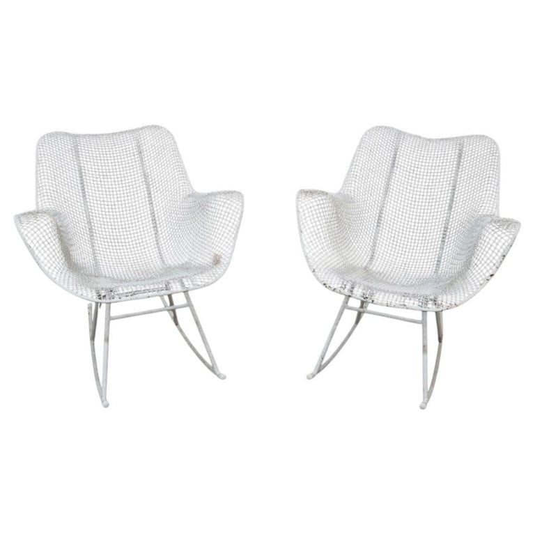 Pair Vintage Russell Woodard (attr) Wire Patio Rocking Chairs C1960: Mid-Century Modern Sculptura wire rocking chairs attributed to Russell Woodard, dating from approximately 1960. These iconic chairs feature a distinctive woven wire mesh design, characteristic of Wood