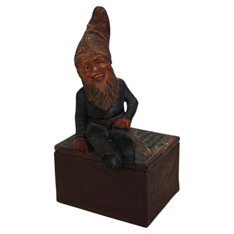 Pottery Gnome Tobacco Box With Associated Newspaper Article, Numbered: Pottery Gnome Tobacco Box With Associated Newspaper Article, Numbered. Measures - 10.75"H x 5.5"W x 5.5"D. ** OPTIONAL IN-HOUSE SHIPPING & DELIVERY - While onsite retrieval is always welcome at no cha